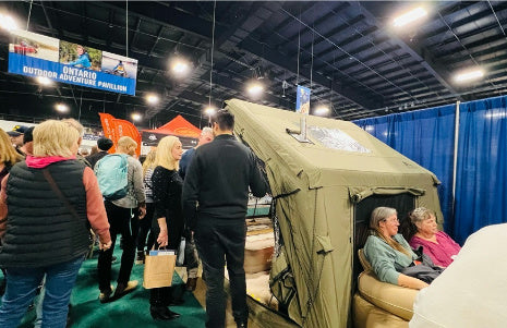 Inflatable tent house for family camping with multiple rooms.